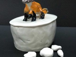 The fox steals the child's pink sandal in the night